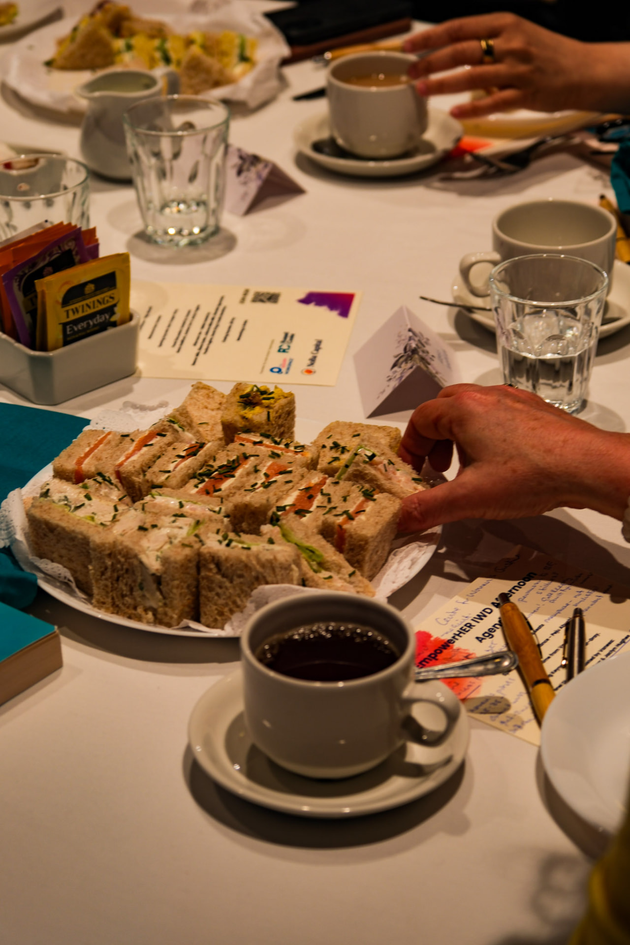 Tea and food on the table at an EmpowerHER afternoon
