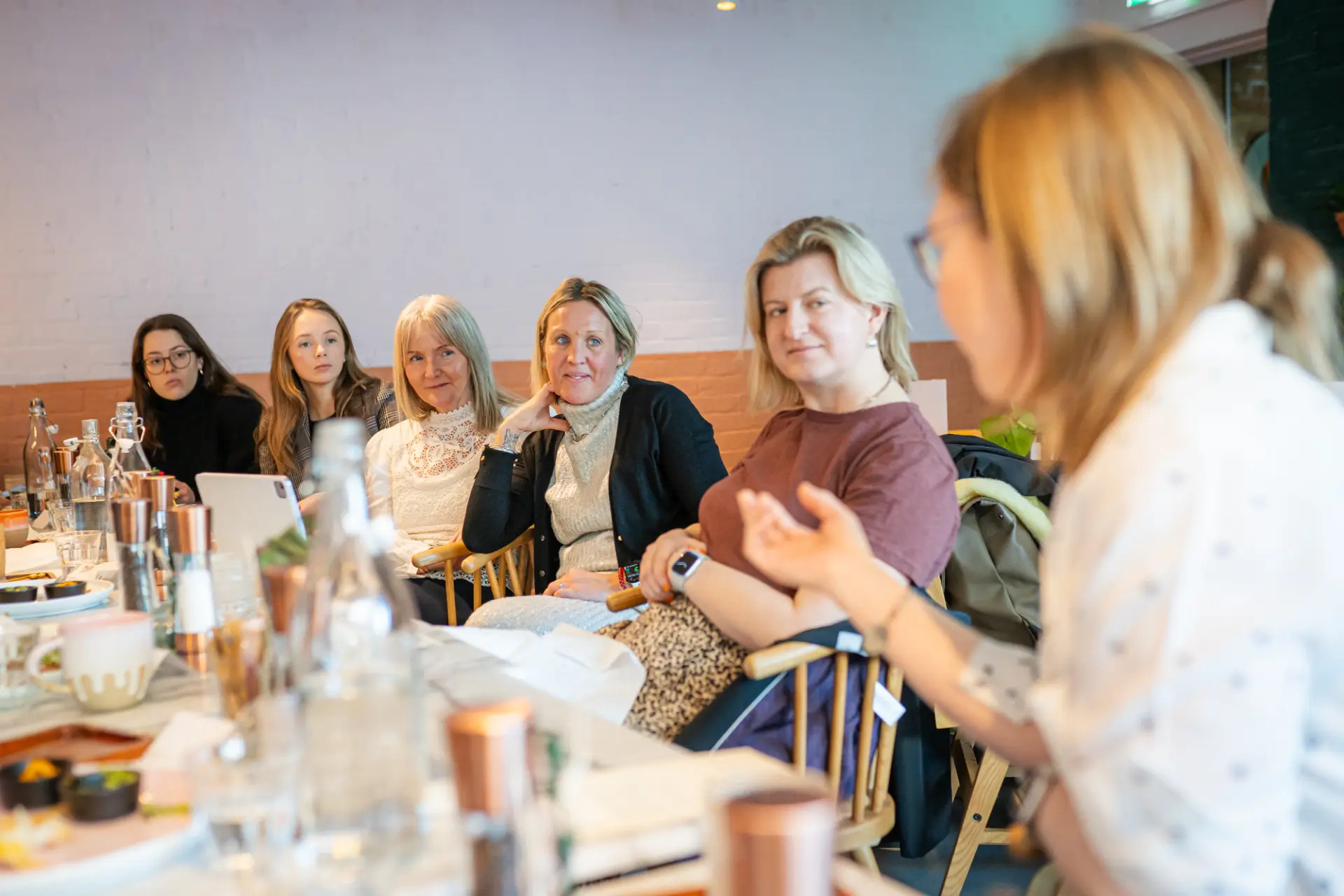 Women in conversation at a NoBa Capital Women’s Breakfast